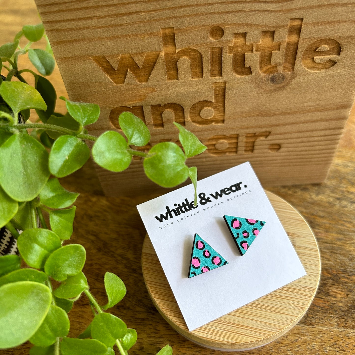 Triangular studs. Turquoise and pink animal print