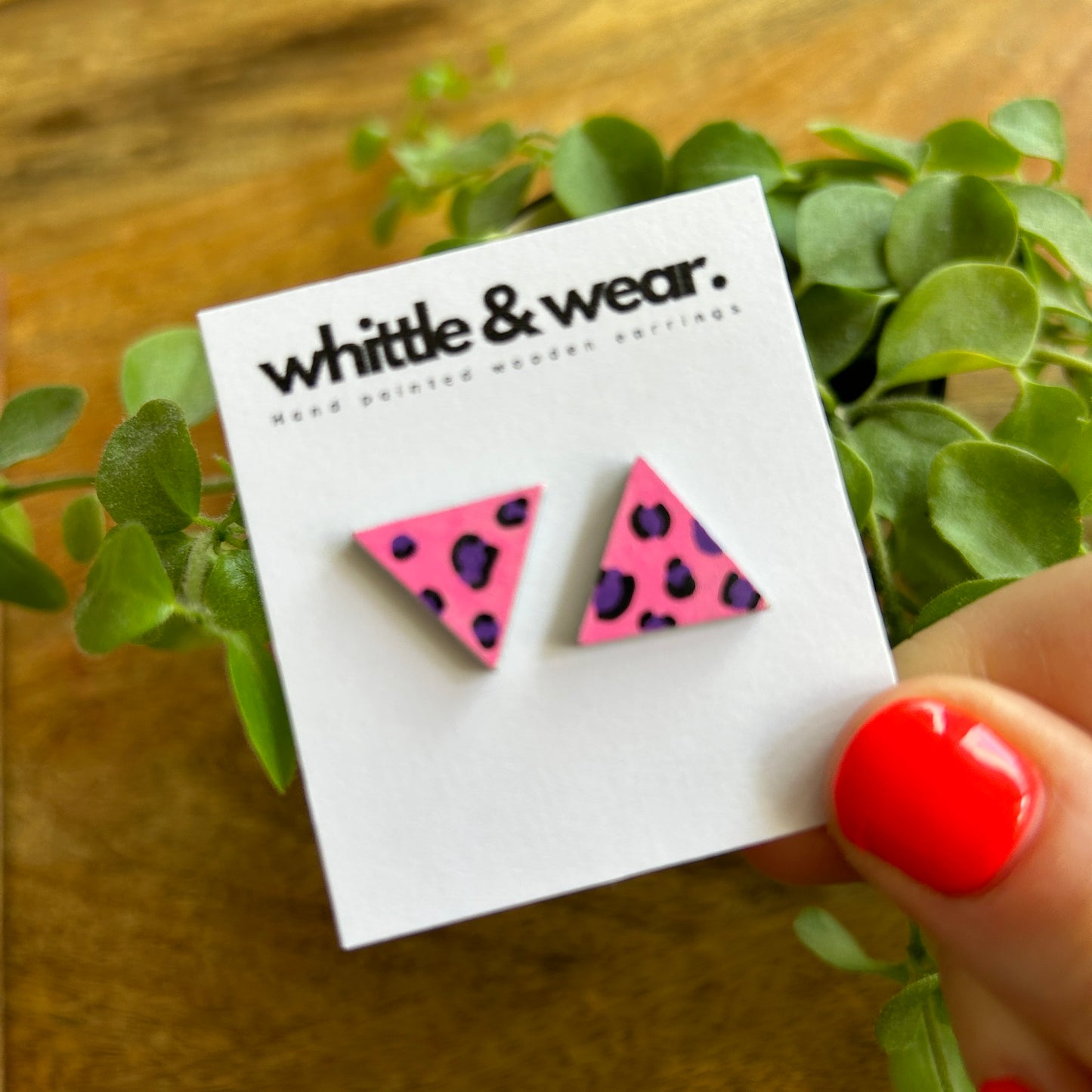 Triangular studs. Pink and purple animal print