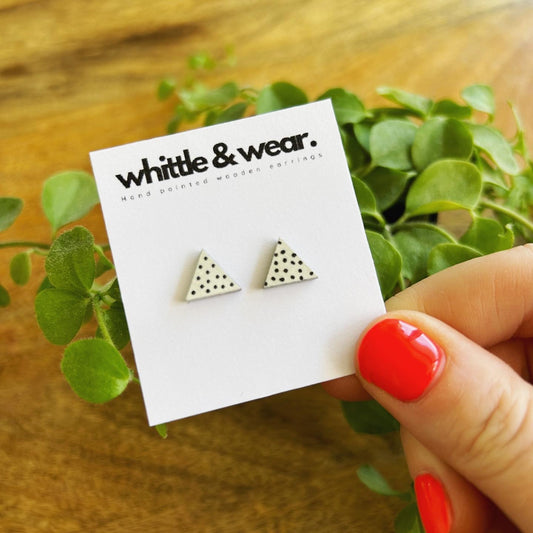 Triangular studs. White and black spots