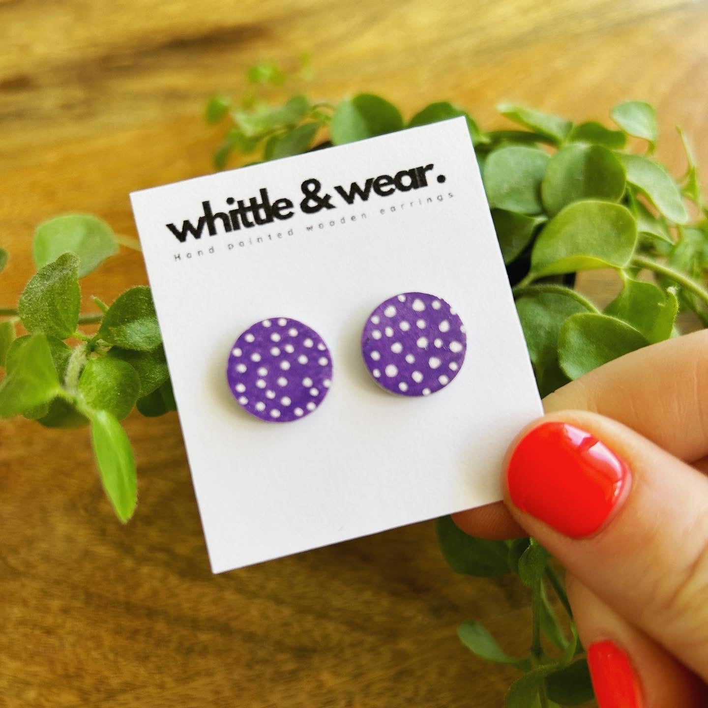 Round studs. Purple with white spots