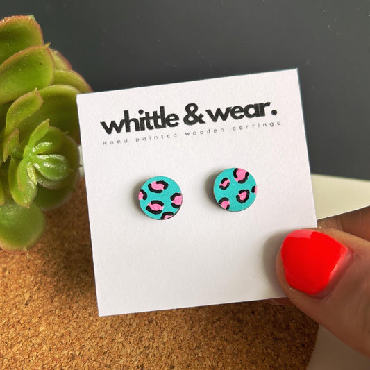 Round studs. Turquoise and pink animal print