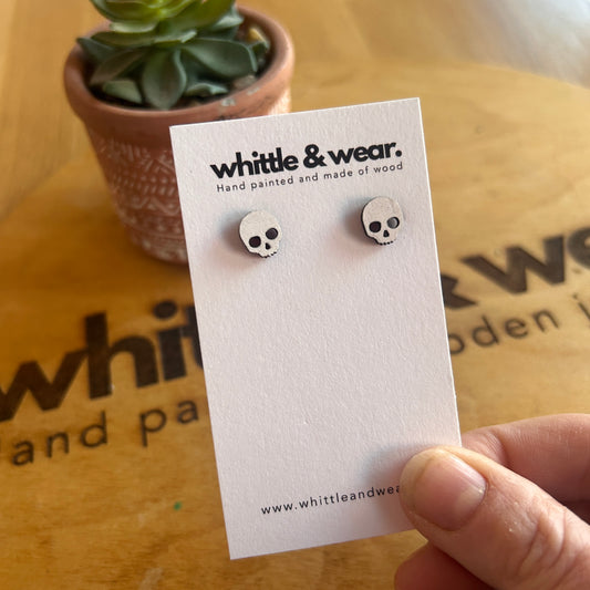 White skull studs