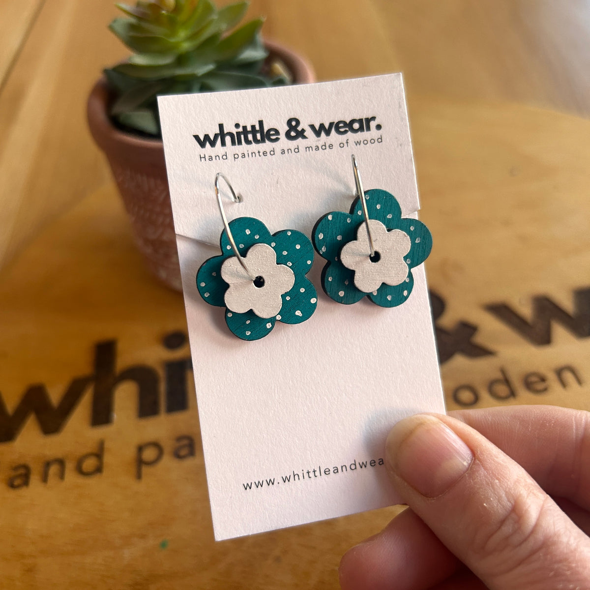 Dark teal and white hoops