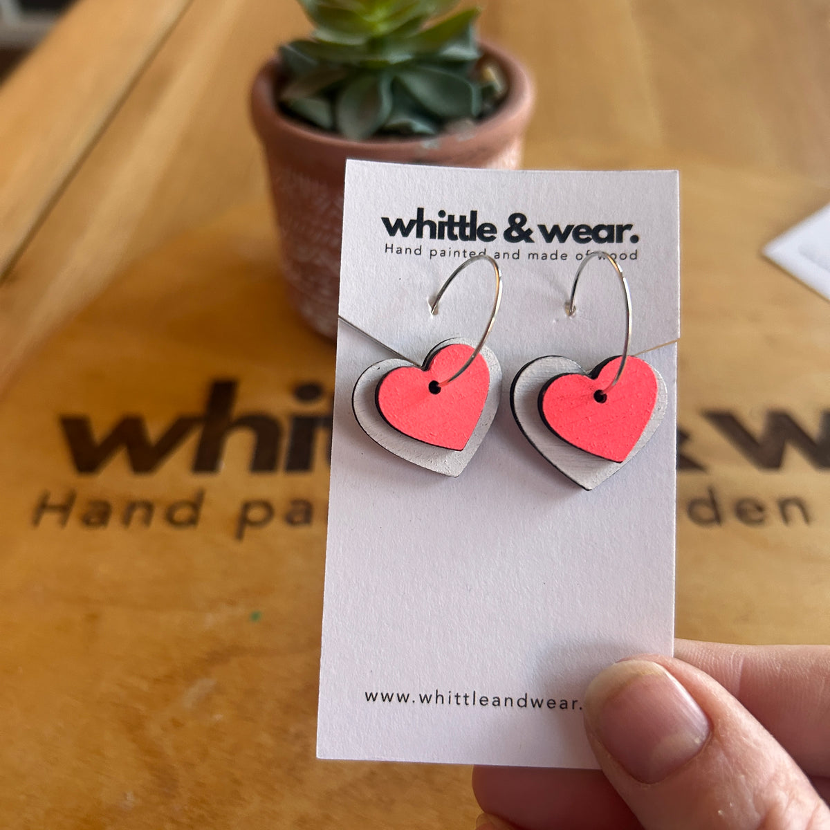 White and pink heart hoops