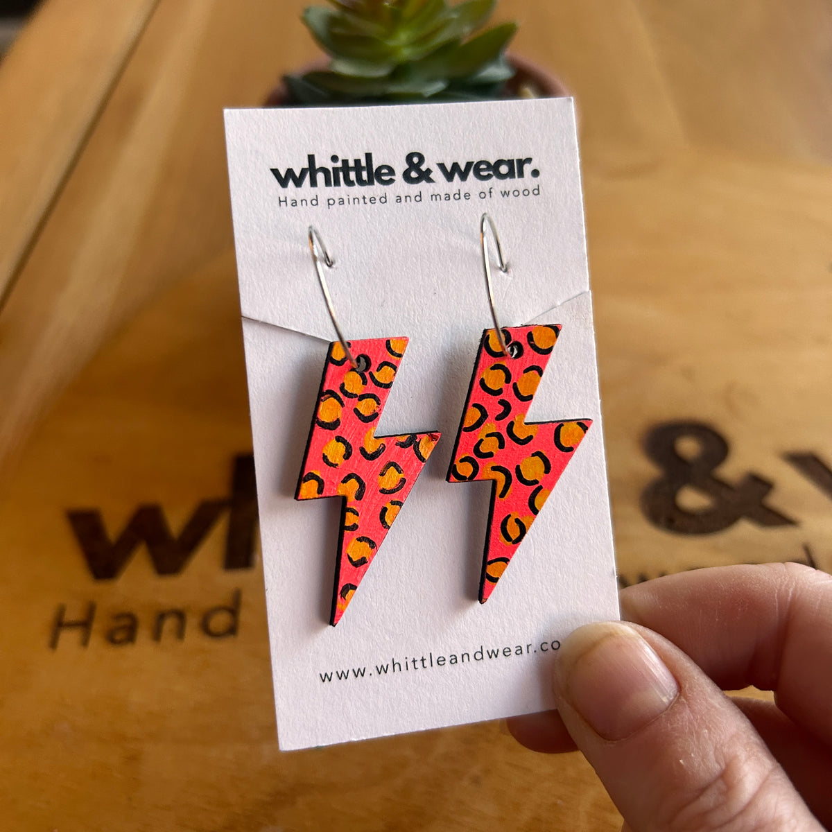 Animal print lightning bolt hoops